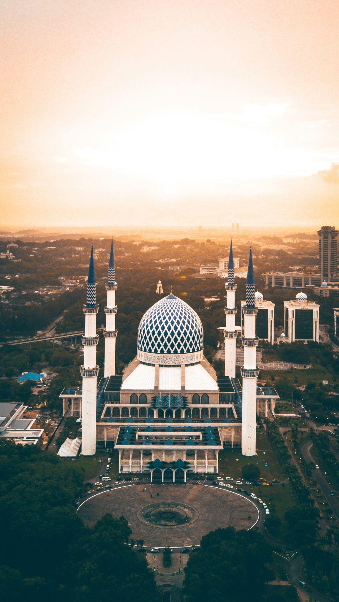 Shah Alam Blue Mosque aerial drone view at sunset